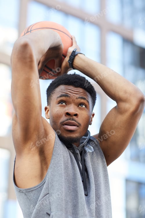Preview: Muscular African-American Man Throwing Basketball Ball
