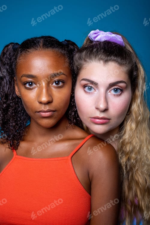 Preview: Confident diverse female models standing close and looking at camera