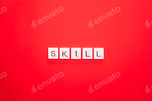 Preview: Skill scrabble letters word on a red background