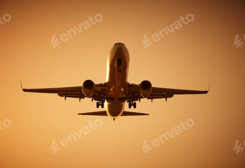 Preview: airplane flying at sunset