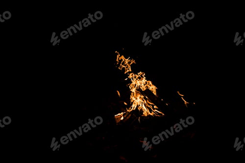 Preview: logs burning in campfire isolated on black