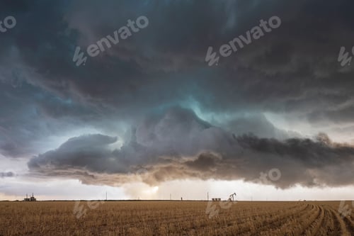 Preview: A supercell event, a severe warning storm, a layer of clouds just above the horizon.