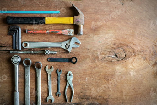Preview: Set of work tools on old grunge wood background with copy space