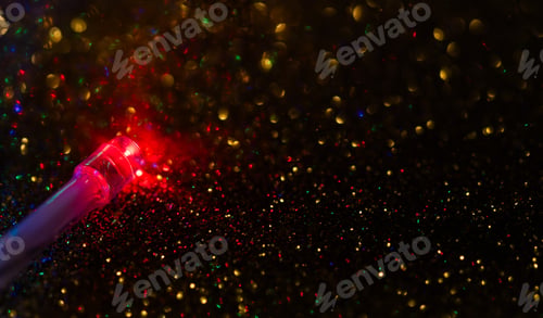 Preview: colorful Christmas lights on dark glitter background