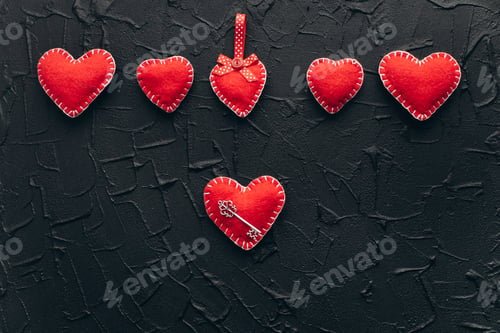 Preview: Valentine's Day Concept. Decorative hearts with keys on a black background.