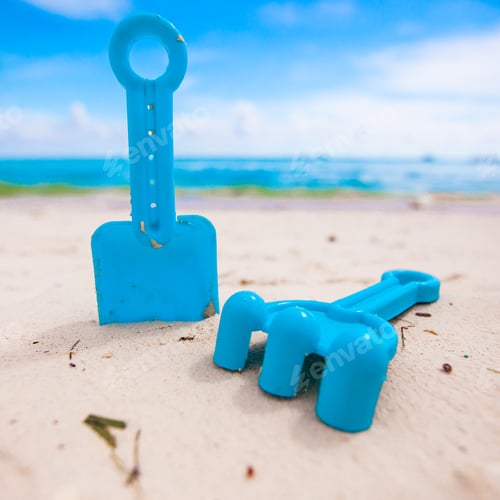 Preview: Summer kid's beach toys in the white sandy beach