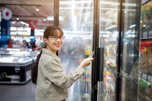 Preview: A woman is smiling and reaching for a product in a store
