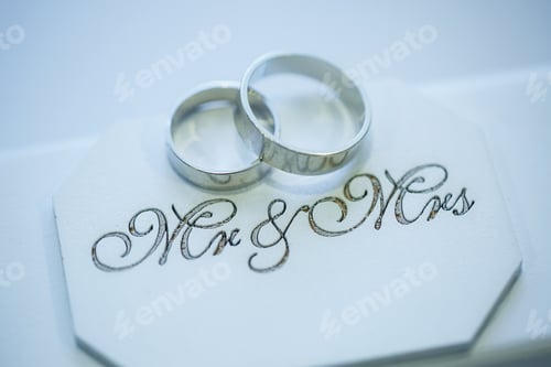 Preview: Golden wedding rings for newlyweds on their wedding day