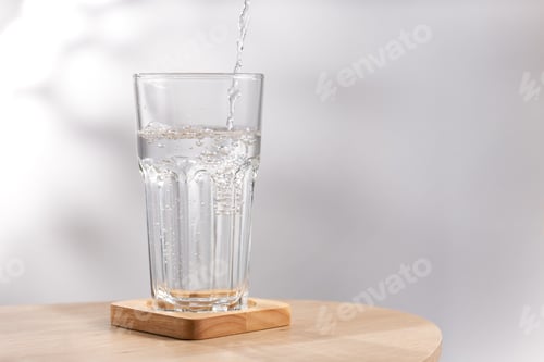 Preview: Glass of Fresh Clean Water Being Poured