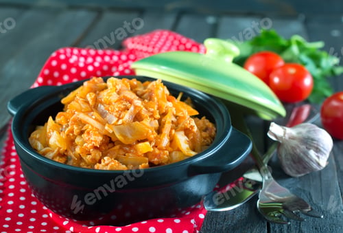 Preview: fried cabbage in bowl and on a table