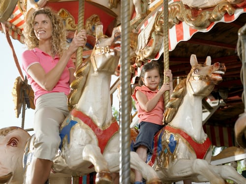 Preview: Mother and daughter on carousel