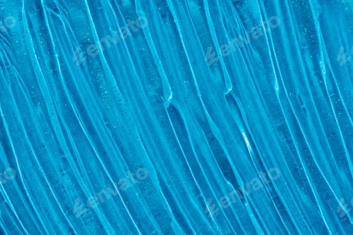 Preview: Clear transparent skincare product sample closeup. Blue gel texture. Hand sanitizer, alcohol gel