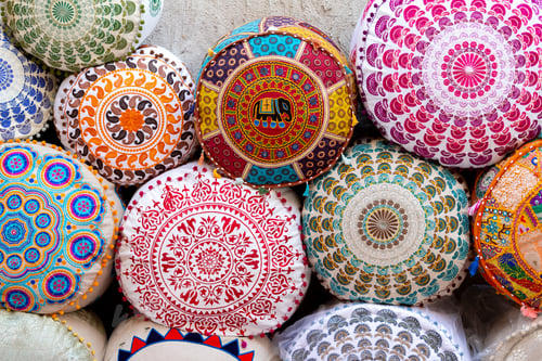 Preview: Colorful cushions with ornaments at the market
