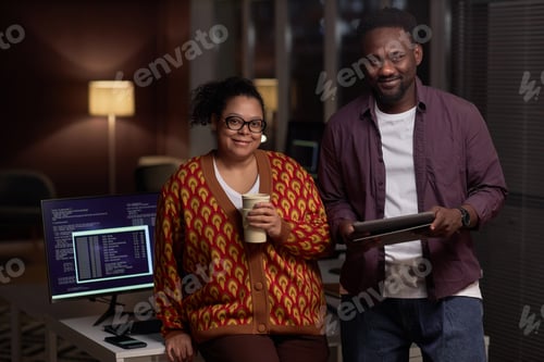 Preview: Couple of programmers working in office together