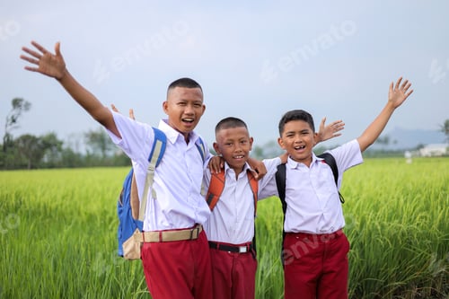 Preview: Young Indonesian Elementary School Boys Cheering And Celebrating In Rice Field