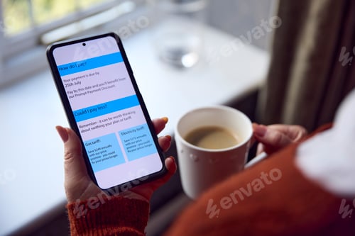 Preview: Senior Woman With Mobile Phone Looking At Online USA Energy Bill In Cost Of Living Energy Crisis