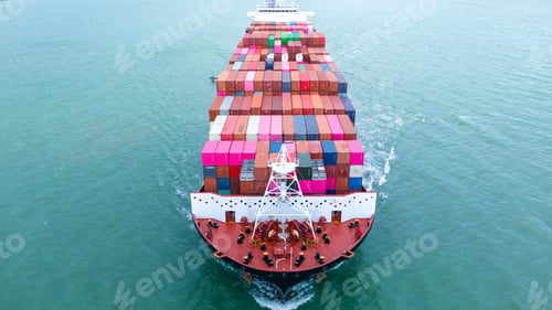 Preview: Front view of Cargo container ship carrying container and running out international