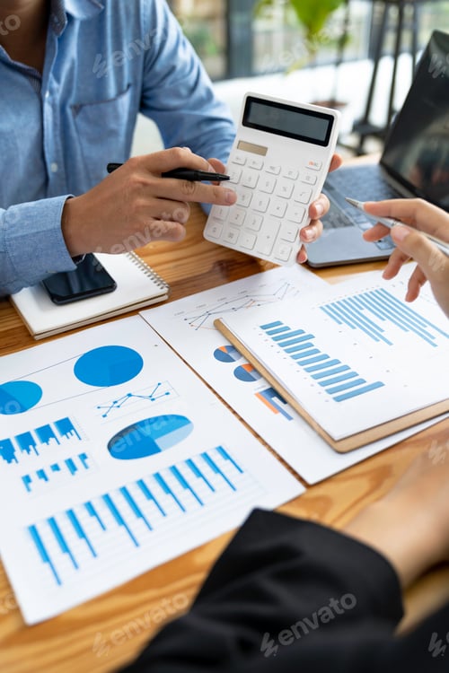 Preview: Financial analyst analysis business financial report on digital tablet during discussion at meeting