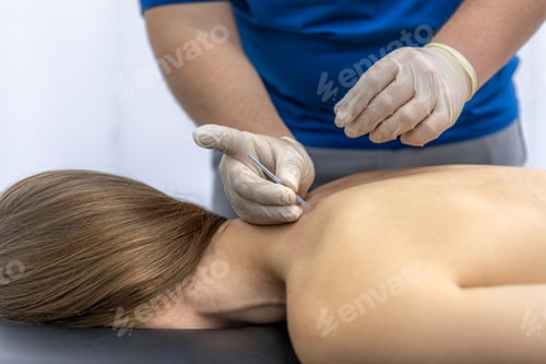 Preview: Doctor checks collarbone and shoulder of female patient in rehab. Pain assessment.
