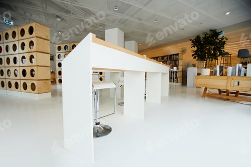 Preview: Modern Library Interior With Tables and Bookshelves