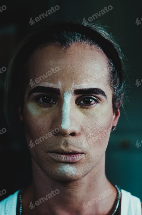 Preview: Young man makes a woman's makeup for lgtbq performance. transvestite. white man making up as a woman