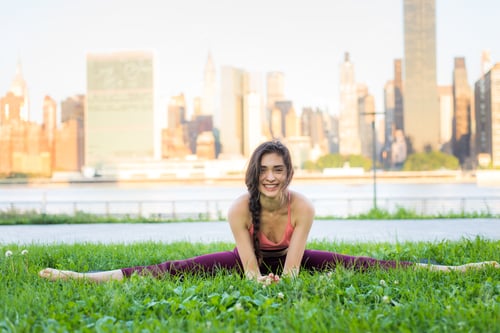 Preview: Woman doing yoga in a park
