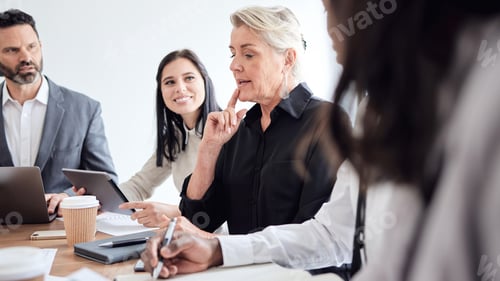 Preview: Shes got so much to teach them. Shot of a group of businesspeople in a meeting at work.