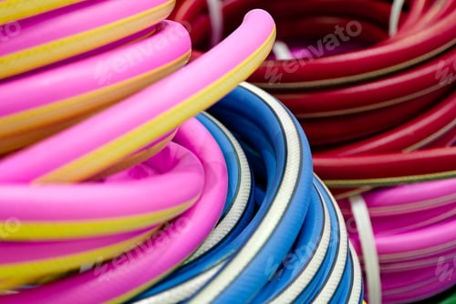 Preview: Rolled up colorful garden hose