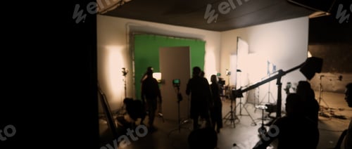 Preview: Blurry images of film crew working and filming in video production studio