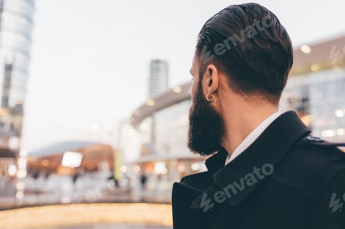 Preview: Young bearded business man outdoor