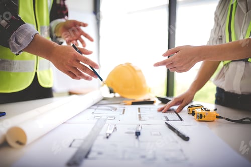 Preview: architect concept, working architect with blueprints in office to present to customers