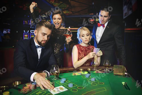 Preview: Group of rich people is playing poker in the casino