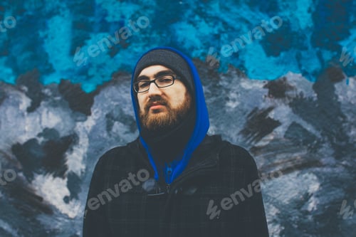 Preview: Portrait of bearded young man wearing winter clothes
