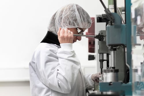 Preview: Female scientist experimenting in laser laboratory