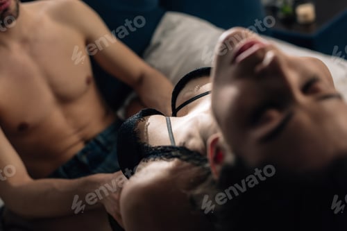 Preview: selective focus of girlfriend and boyfriend having sex in bedroom