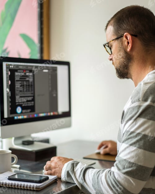 Preview: Man working on the desktop