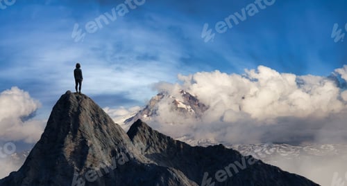 Preview: Adventurous Adult Woman Hiker on top of Rocky Mountain