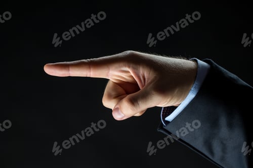 Preview: close up of hand pointing finger to something