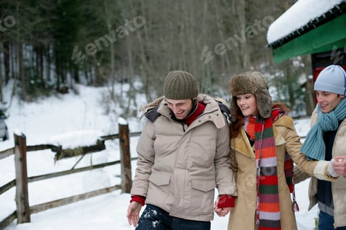 Preview: Friends enjoying a winter walk in the snow