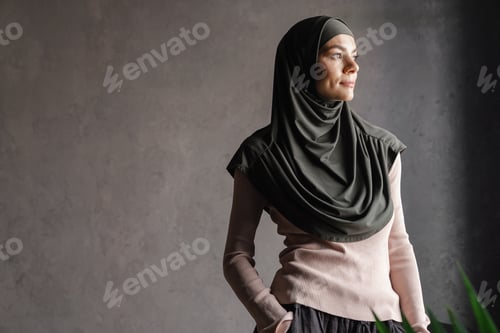 Preview: Woman in Headscarf Looking Away From Camera