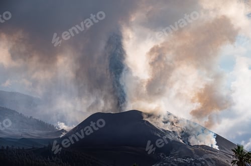 Preview: Active volcano with thick smoke erupting in daytime