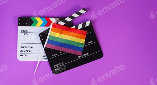 Preview: Two Clapper board and rainbow pride flag on purple or violet background.