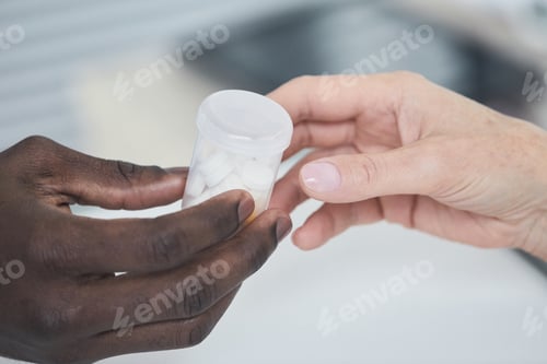 Preview: Man giving pills to woman
