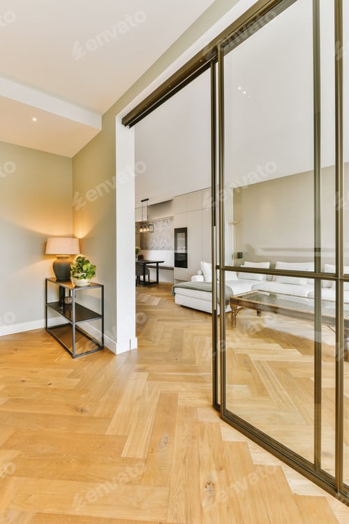 Preview: a view of a living room through a glass door
