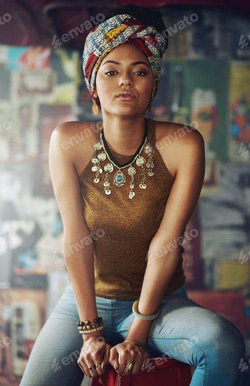 Preview: Im confident in myself. Cropped portrait of an attractive young woman sitting on a stool.