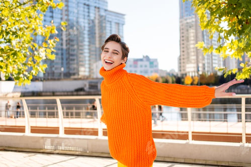 Preview: Beautiful young woman with short hair in the city