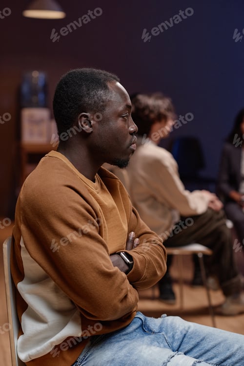 Preview: Young Man In Group Therapy Session