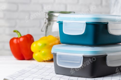 Preview: Closed plastic lunch box on kitchen table