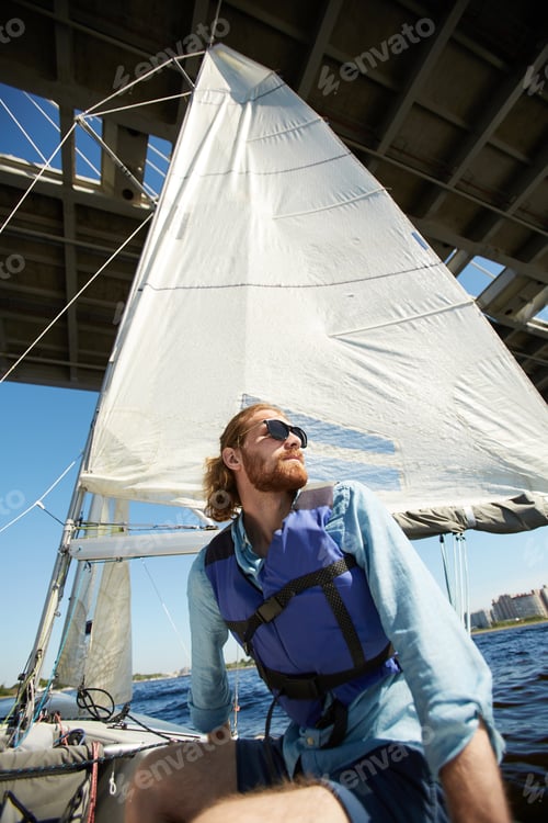 Preview: Sailor feeling freedom on boat