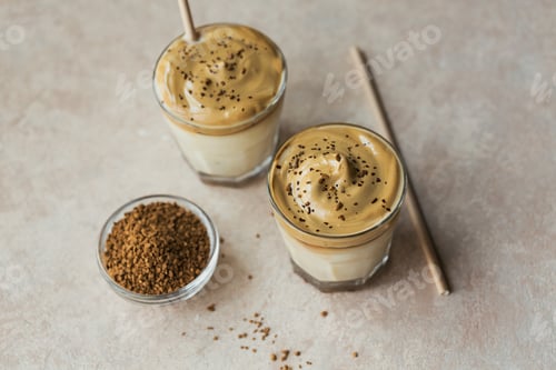Preview: Glass of Iced Dalgona Coffee, trendy fluffy creamy whipped coffee and milk